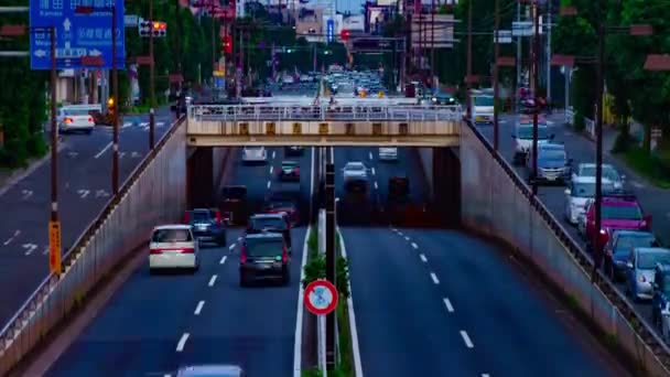 En timelapse af downtown gade på Kanpachi avenue i Tokyo dagtimerne lang skudt tilt – Stock-video