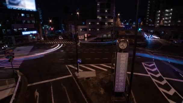 Een avond timeapse van de verkeersopstopping bij de stad straat in Tokio wijd shot zoom — Stockvideo