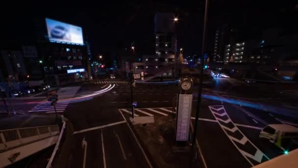Ночной хронометраж пробки на городской улице в Токио широкий наклон выстрела — стоковое видео