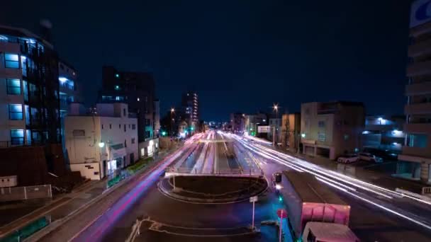 東京の街中の渋滞の夜のタイムラプスワイドショット傾き — ストック動画