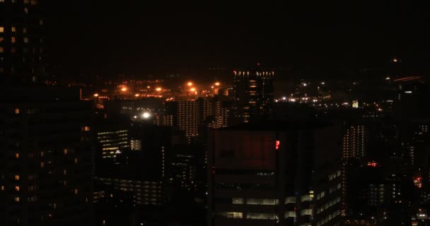 Un paesaggio urbano notturno a Shinagawa Tokyo high angle long shot — Video Stock