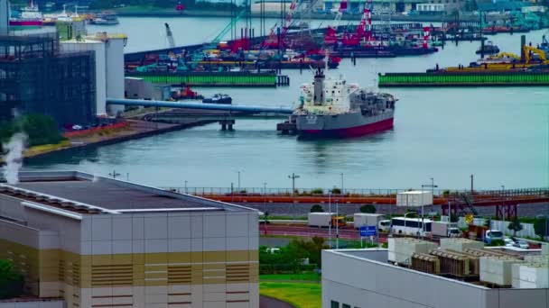 Un timelapse de vista de ángulo alto cerca del área de la bahía en Tokio tiro largo diurno — Vídeo de stock