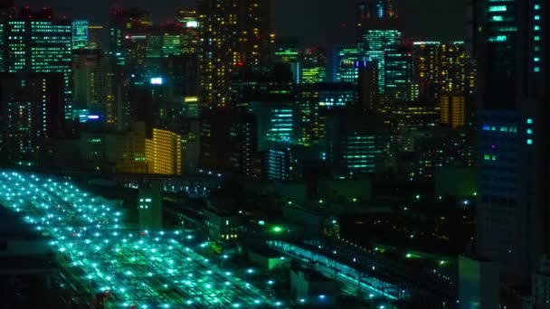 Μια νύχτα timelapse πανοραμική θέα στην αστική πόλη στο Τόκιο υψηλής γωνίας μακρινό σουτ ζουμ — Αρχείο Βίντεο