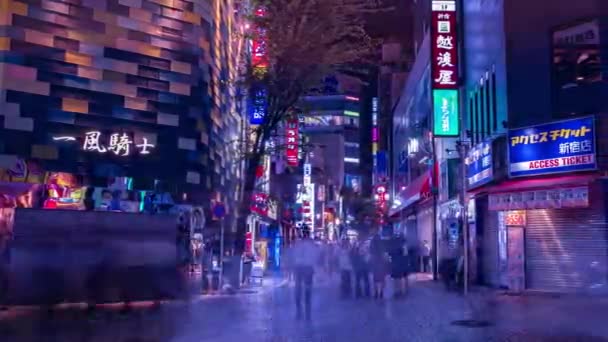Um timelapse da noite da cidade do neon em Setagaya Tokyo panning largo — Vídeo de Stock