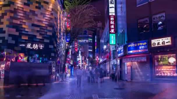 Een avond timeapse van de neon stad in Setagaya Tokio wijd kantelen — Stockvideo