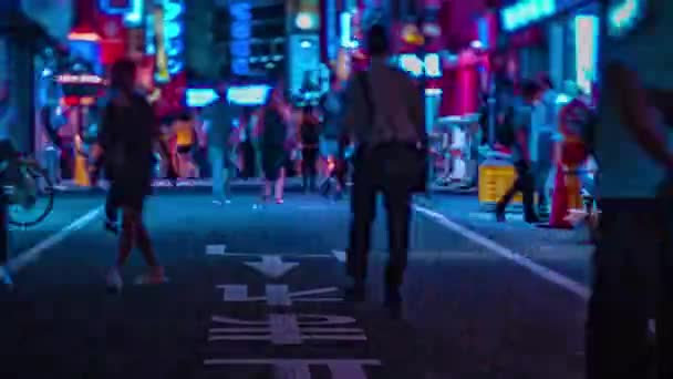 A night timelapse of the neon street at the downtown in Shinjuku Tokyo tiltshift zoom — Stock Video