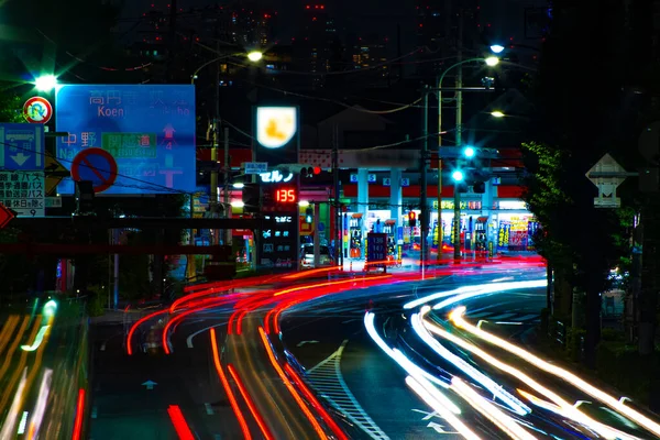 A timelapse of the downtown street at OUME avenue in Tokyo long exposure — Fotografia de Stock