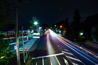 Tokyo 'daki OUME Bulvarı' ndaki şehir merkezinin zaman çizelgesi.