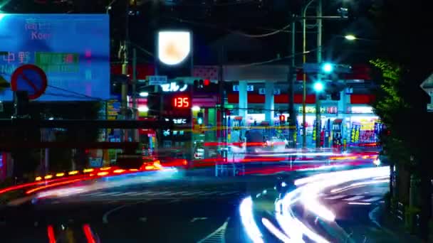 A timelapse of the downtown street at OUME avenue in Tokyo long exposure zoom — Vídeo de Stock