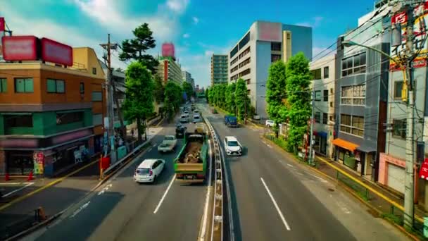 Хронология улицы в центре города на проспекте Канпачи в Токио, дневной наклон — стоковое видео