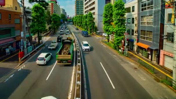 Timelapse śródmieścia ulica na Kanpachi aleja w Tokio dzienny szeroki strzał panning — Wideo stockowe