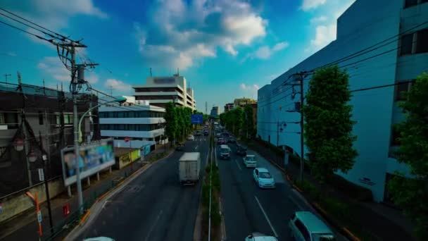 Ein Zeitraffer der Innenstadt-Straße an der Kanpachi-Allee in Tokio tagsüber Weitwinkelzoom — Stockvideo