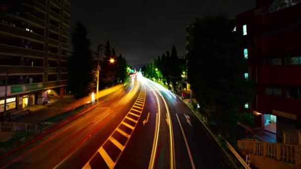 A timelapse of the downtown street at OUME avenue in Tokyo long exposure wide shot zoom — Stock Video