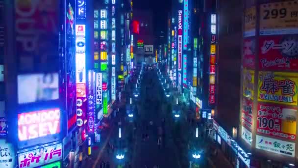 Vue timelapse d'un passage à niveau dans le quartier Shinjuku de Tokyo — Video