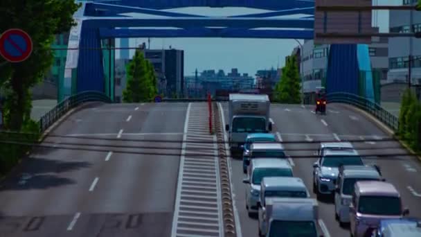 A timelapse of downtown street at Kanpachi avenue in Tokyo long shot tilt — Vídeo de Stock