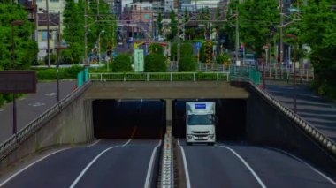 Tokyo 'da Kanpachi Bulvarı' ndaki şehir merkezinin zaman çizelgesi.