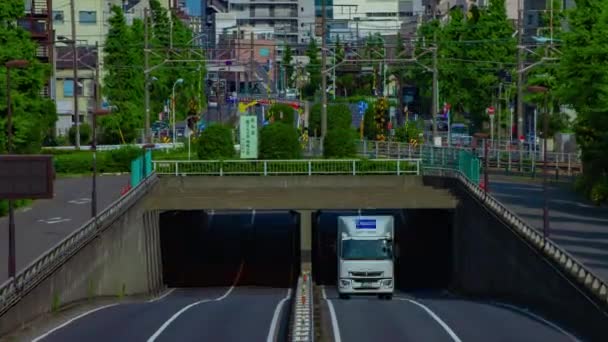 A timelapse of downtown street at Kanpachi avenue in Tokyo long shot zoom — Stock video