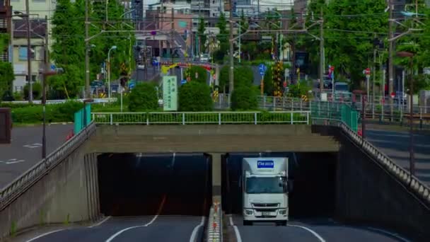 Un timelapse della strada del centro di Kanpachi avenue a Tokyo zoom long shot — Video Stock