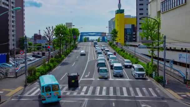 A timelapse of downtown street at Kanpachi avenue in Tokyo wide shot zoom — Vídeo de Stock