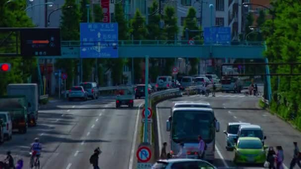 A timelapse of downtown street at Kanpachi avenue in Tokyo long shot tilt — Stock Video