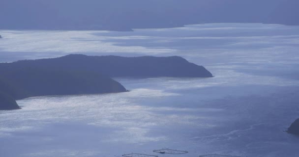 Cypel takachiyama w pobliżu błękitnego oceanu w Amami Oshima Kagoshima wysoki kąt — Wideo stockowe