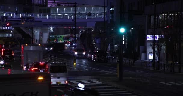 Un ingorgo notturno nella strada del centro di Shibuya Tokyo. — Video Stock