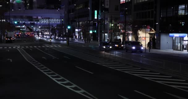 Um engarrafamento noturno na rua central de Shibuya Tokyo — Vídeo de Stock