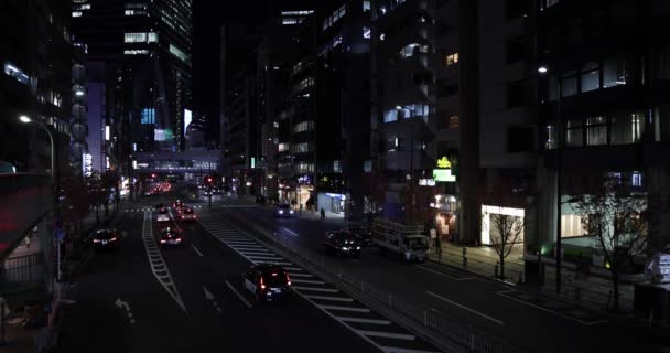 Um engarrafamento noturno na rua central de Shibuya Tokyo — Vídeo de Stock