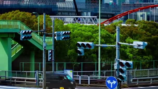 Uma cronologia do engarrafamento no cruzamento da cidade em Tóquio zoom de tiro longo — Vídeo de Stock