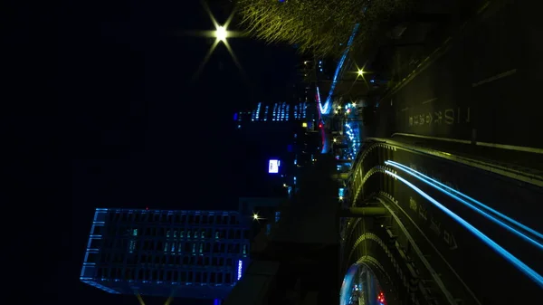 Night time lapse street at the business town in Akasaka Tokyo vertical — Stock Photo, Image