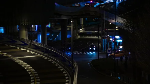 Night time lapse street at the business town in Akasaka Tokyo middle shot