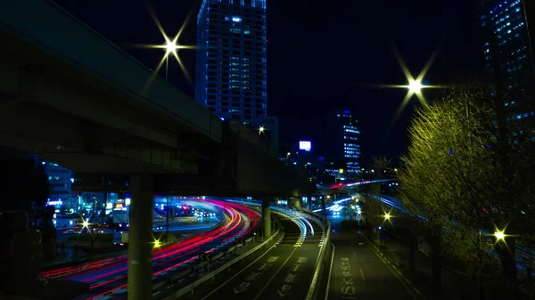Night time lapse street at the business town in Akasaka Tokyo wide shot