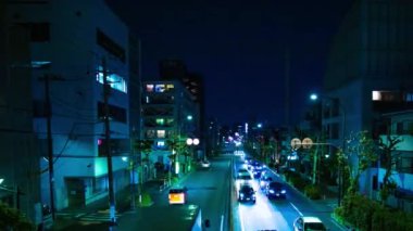 Tokyo 'daki şehir merkezindeki trafik sıkışıklığının gece çekimleri.