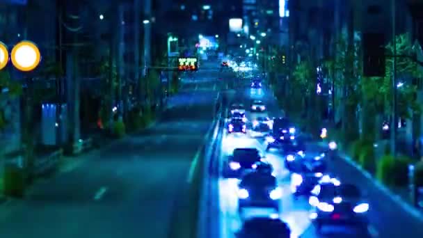 Tokyo tilt şehir merkezindeki minyatür trafik sıkışıklığının gece zamanı. — Stok video