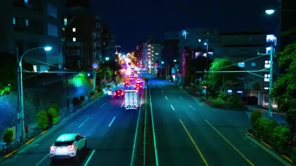 Uma cronologia noturna do engarrafamento no centro da rua em Tóquio zoom de tiro largo — Vídeo de Stock