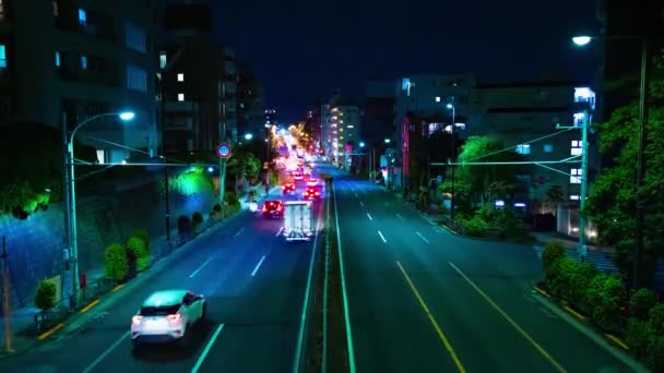 東京の繁華街での渋滞の夜のタイムラプスワイドショット — ストック動画