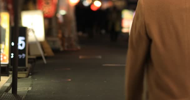 Walking People Neon Town Night Long Shot Handheld Minato District — Stockvideo