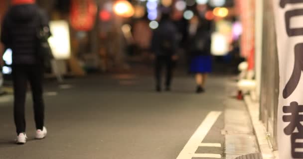 Walking People Neon Town Night Long Shot Handheld Minato District — Stockvideo