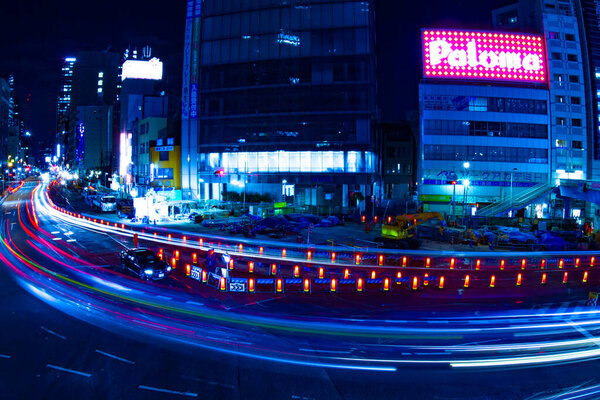 Night time lapse urban street at the business town. Shinjuku-ward Shinjuku Tokyo Japan 01.22.2019 : It is a city location in Tokyo. camera : Canon EOS 5D mark4