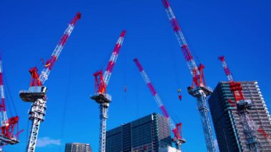 Yapım aşamasında geniş atış ta hareketli vinçler bir zaman atlamalı. Kouto district Ariake Tokyo Japan - 02.18.2019 kamera : Canon Eos 5d mark4