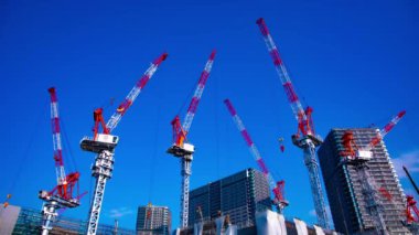 Yapım aşamasında geniş atış ta hareketli vinçler bir zaman atlamalı. Kouto district Ariake Tokyo Japan - 02.18.2019 kamera : Canon Eos 5d mark4