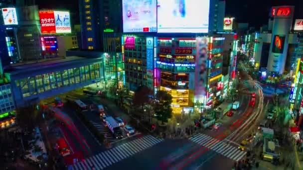 ネオンの町の高角度幅ショット傾きで夜の時間経過交差点 渋谷区東京都 2019年2月14日 東京都内の中心部です カメラ Canon Eos Mark4 — ストック動画