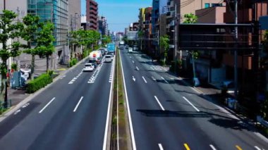 Tokyo 'daki şehir sokağındaki trafik sıkışıklığının zaman aşımı. Yüksek kalite 4K görüntü. Tokyo Japonya 05.18.2022 Tokyo 'da bir şehir caddesi.. 