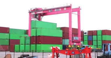 Industrial crane and container in Tokyo cloudy day. High quality 4k footage. Koto district Aomi Tokyo Japan 05.20.2022 Here is called Aomi Container Wharf. It is one of the container wharves in the