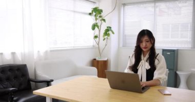 Tokyo Japan 06.19.2022. This working scene is acted by Japanese model in the office. High quality 4k footage