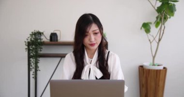 Tokyo Japan 06.19.2022. This working scene is acted by Japanese model in the office. High quality 4k footage