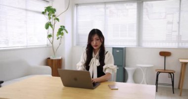 Tokyo Japan 06.19.2022. This working scene is acted by Japanese model in the office. High quality 4k footage