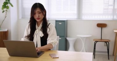 Tokyo Japan 06.19.2022. This working scene is acted by Japanese model in the office. High quality 4k footage