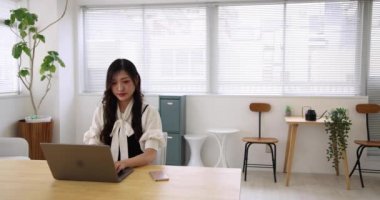 Tokyo Japan 06.19.2022. This working scene is acted by Japanese model in the office. High quality 4k footage