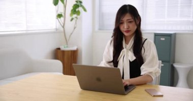 Tokyo Japan 06.19.2022. This working scene is acted by Japanese model in the office. High quality 4k footage